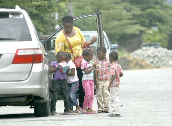 Picture by Mark Richards-Bimbo Ayelabola, pictured in Lagos, Nigeria with her children.